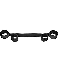 Spreader bar with hand and ankle cuffs